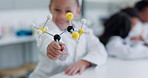 Girl, molecular structure and child scientist in class with education, knowledge with earning and study at school. Lab research, student in science classroom and happy with growth and development