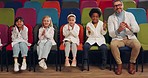 Applause, wow of teacher and science students learning in kindergarten together. Clapping, scientist and happy group of kids on chair in portrait, experiment and education surprise to study in school