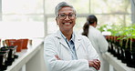 Scientist, face and woman with arms crossed in greenhouse for botany research. Science portrait, mature medical professional and confident doctor in agriculture, happy and smile with glasses at farm