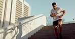 Man, running and exercise legs on stairs, outdoor and athlete training for fitness goals in Chicago summer morning. Runner, steps and sports workout to train for healthy cardiovascular wellness 