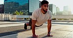 Fitness, rooftop and man on the floor for exercise, wellness and morning cardio routine outdoor. Balcony, workout and male athlete on ground for body, lifting or resilience, energy or planking power