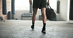 Gym, walking and legs of a man with a bag to start exercise, sports training or workout for wellness. Feet of an athlete person arrival at health club for fitness, strong muscle and commitment