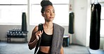 Woman thinking, fitness and walking in gym after exercise, workout and training at wellness club. Bag, sweat towel and female athlete relax at a health studio done with sports class of a girl