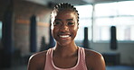 Gym face, black woman and happy for exercise, training and female bodybuilder workout, challenge or boxing studio pride. Sports personal trainer, coach portrait and smile for active fitness club