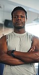 Fitness, training and face of black man in gym with crossed arms for bodybuilder, exercise and workout. Sports, personal trainer and portrait of confident person for challenge, wellness and health