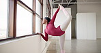 Dance, workshop and a black woman stretching for ballet while getting ready for training, recital or rehearsal. Fitness, art and warm up with a young ballerina in a creative studio for expression