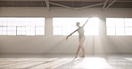 Dance, ballet and blur with woman in studio for performance, theater and creative academy Health, music and freedom with elegant ballerina training in class for wellness, practice routine and balance