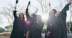 Happy students, graduation and hats in celebration, achievement or accomplishment together at campus. People, friends or graduate in milestone, degree or diploma in happiness for education or goals