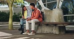 College, friends and talking on a campus bench about education, course or collaboration on project together. Social, university student and people in conversation about lesson, research or assessment