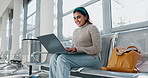 Campus, university and student with laptop typing learning, studying and working on an assignment online. Happy, school and woman or person doing research or smile for exam results for education