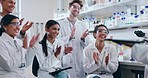 Science, success and people in celebration of results in project, research or innovation breakthrough in biotechnology. Scientist, clapping or group of colleagues praise for experiment or report