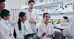 Science, research and professor with students in the laboratory for discussion on medical project. Teamwork, education and senior mentor with group of scientists with questions for biology experiment