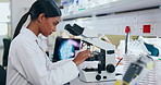 Science, microscope and a student woman in a laboratory for research, innovation or medical breakthrough. Medicine, pharmaceuticals and sample study with a girl scientist working in a biology lab