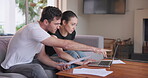 Couple, documents and laptop on sofa for budget, investment planning or home administration. Man, woman and paperwork at computer for savings, taxes and online banking for loan, insurance or mortgage