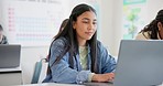 Woman, student and laptop for school, elearning and studying or research in college or class. Girl typing on computer for university planning, classroom information and scholarship application or FAQ