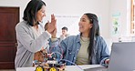 Learning, teacher and high five of student on laptop in classroom, achievement or goal in robotics. Engineering, computer and teenager celebrate success, happy girl and study education at high school