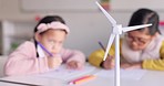 Education, model wind turbine for renewable energy with children in class for sustainability or ecology. Kids, innovation and engineering with students in a classroom to research alternative power