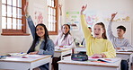 Hands raised, students and question in high school, learning and study in classroom. Group education, teenager and answer, asking why and kids development of knowledge for children listening together