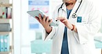 Tablet, hands and closeup of woman doctor in hospital doing research for diagnosis or treatment. Digital technology, healthcare and medical worker doing online consultation for telehealth in clinic.