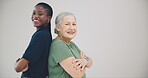 Old woman, laughing or happy caregiver standing by mockup for support on white background. Arms crossed, wall space or face of nurse with a funny mature person with love, smile or care for wellness