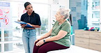 Physiotherapist, clipboard and senior woman consultation on knee pain, client injury and consulting on chiropractic rehabilitation. Physical therapy, checklist and Indian chiropractor helping patient