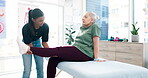 Physiotherapist, senior woman and legs support, anatomy care or healing knee pain, client injury or joint problem. Physiotherapy, chiropractic rehabilitation or orthopedic service for elderly patient