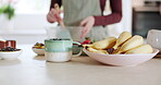 Home kitchen, banana and person cooking nutrition food, fruit salad or morning breakfast for healthy eating. Wellness nutritionist, organic product and health chef ingredients for weight loss diet