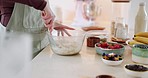 Cooking, baking or hands in kitchen for cake recipe, chocolate dessert or mixing flour pastry in bowl. Person, food closeup or chef with fruit or dough to prepare a meal in home for lunch snack