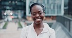 Fitness, smile and face of black woman in the city running for race, marathon or competition training. Happy, sports and portrait of female athlete runner doing a cardio workout or exercise in town.