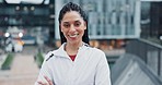 Fitness, happy and face of woman in the city running for race, marathon or competition training. Smile, sports and portrait of female athlete runner doing a cardio workout or exercise in town.