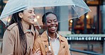 Women, travel and city with umbrella and friends, insurance and rain with smile and talking outdoor. Commute, journey to work and wet winter weather, urban street and professional with security