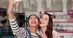 Women, silly selfie and happy friends in a restaurant with profile picture and social media. Bruch, smile and laughing young people together with bonding and photo for post in a cafe or coffee shop