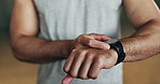 Smart watch, hands and man in gym for fitness, exercise results and workout performance. Stopwatch, closeup and check information, timer and tracking healthy training progress, clock and sports gear