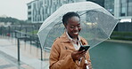 Phone, walking and black woman in rain in a city typing on social media or search location on internet or app gps. Winter, umbrella and person on vacation or holiday and chatting with connection