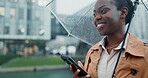 Phone, mockup and black woman in rain in a city typing on social media or search location on internet or app gps. Winter, umbrella and person on vacation or holiday and chatting with connection