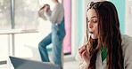 Laptop, remote work and a woman in a bakery, eating dessert while working on content for her blog. Computer, smile and a happy young customer typing as a freelance journalist in a coffee shop or cafe