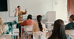 School, question and a woman teacher in a class for learning, growth or development with a lesson. Education, teaching and classroom with a student, hand raised to answer during an academy lecture