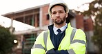 Confidence, portrait and man in civil engineering for urban building planning with arms crossed for safety. Architecture, real estate and project management, serious contractor on construction site.