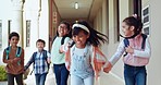 School, friends and children running in hallway excited for education, learning and class lessons. Happy, students and young kids holding hands for child development, growth and knowledge at academy