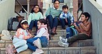 Education, teacher and children on stairs at school ready for class, learning and lesson at academy. Students, campus and group of young kids on steps for child development, growth and knowledge