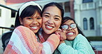 Happy, face and teacher with children at kindergarten for education, learning and outdoor fun together on playground. Smile, portrait and kids or students hug woman teaching in montessori school