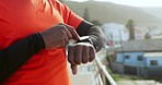 Fitness, training and black man on smart watch for performance, cardio tracking and mobile app for health. Sports, wellness and athlete check time for marathon goals, exercise and workout outdoors