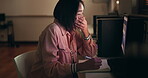 Student, woman and tired on computer for night research, studying and writing notes for university or college. Young person with depression, fatigue and yawning on campus PC and notebook for learning