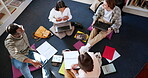 Students in library, studying together and education, people learning and discussion with books and technology. Top view, communication with young men and women, scholarship and academic group work