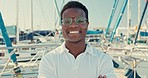 Ocean, travel and face of happy man on boat for sailing, crew or employee on yacht in the sea, harbor or marina. Ship, worker and portrait of sailing on water with smile of person on dock or pier