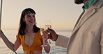 Love, cheers and couple on yacht with champagne, smile and ocean cruise for luxury holiday. Toast, drinks and romantic sunset date on boat, happy woman and man with wine glass to celebrate marriage.