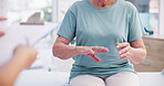 Hands, arthritis and senior woman in consultation with nurse for joint pain, problem and healthcare checklist in clinic. Elderly, patient and doctor with insurance survey in medical conversation 