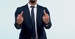 Business, man and middle finger with stress, frustrated or sign language on a white studio background. Person, consultant or professional with rejection, rude or anger with conflict, opinion or emoji