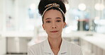 Face, chef and serious woman in kitchen at restaurant of small business. Portrait, cooking and confident worker, culinary expert and professional employee in hotel for catering career in South Africa