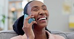 Black woman, funny joke and laughing on phone call with conversation and talk on home sofa. African female person, couch and mobile networking with smile and comedy from living room discussion